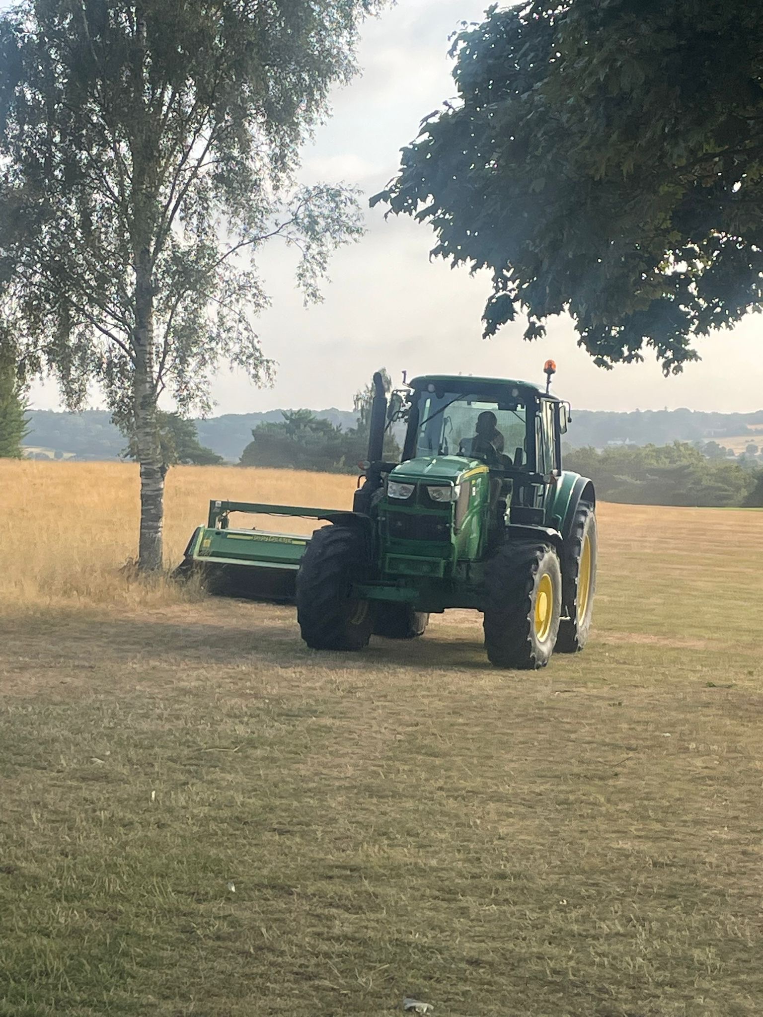 The farmer in his tractor is out and about